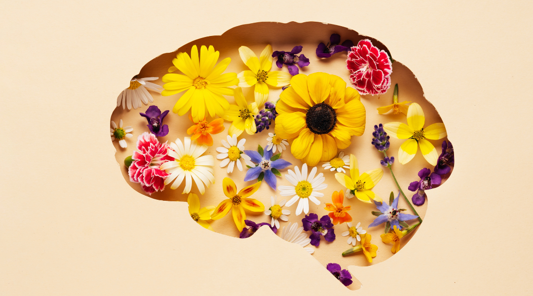a brain filled with flowers graphic representing World Mental Health Day